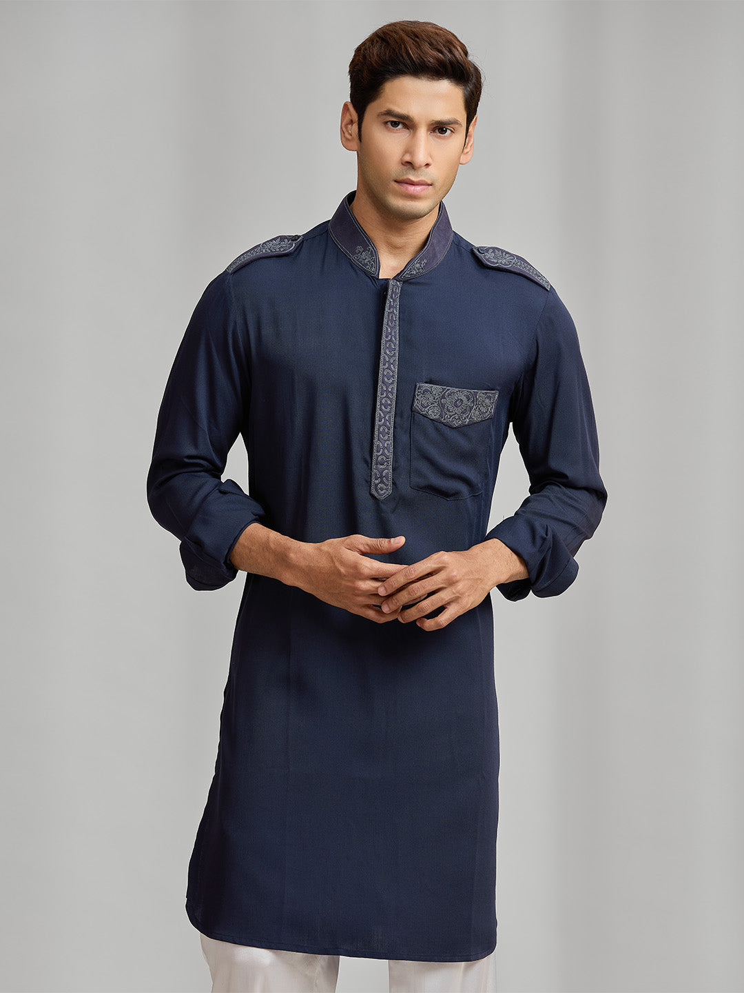 Navy blue silk kurta set with tonal embroidery, paired with white bottoms. - KORANM