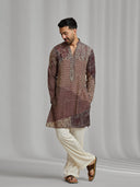 Maroon and cream silk-blend kurta with a multi-patterned layout print, paired with cream bottoms. - KORANM