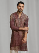 Maroon and cream silk-blend kurta with a multi-patterned layout print, paired with cream bottoms. - KORANM
