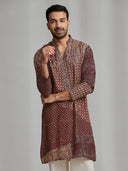 Maroon and cream silk-blend kurta with a multi-patterned layout print, paired with cream bottoms. - KORANM