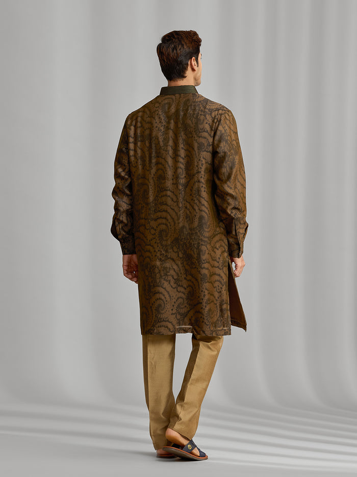 Olive silk-blend kurta with rhythmic print, paired with antique gold Aligarhi pants. - KORANM