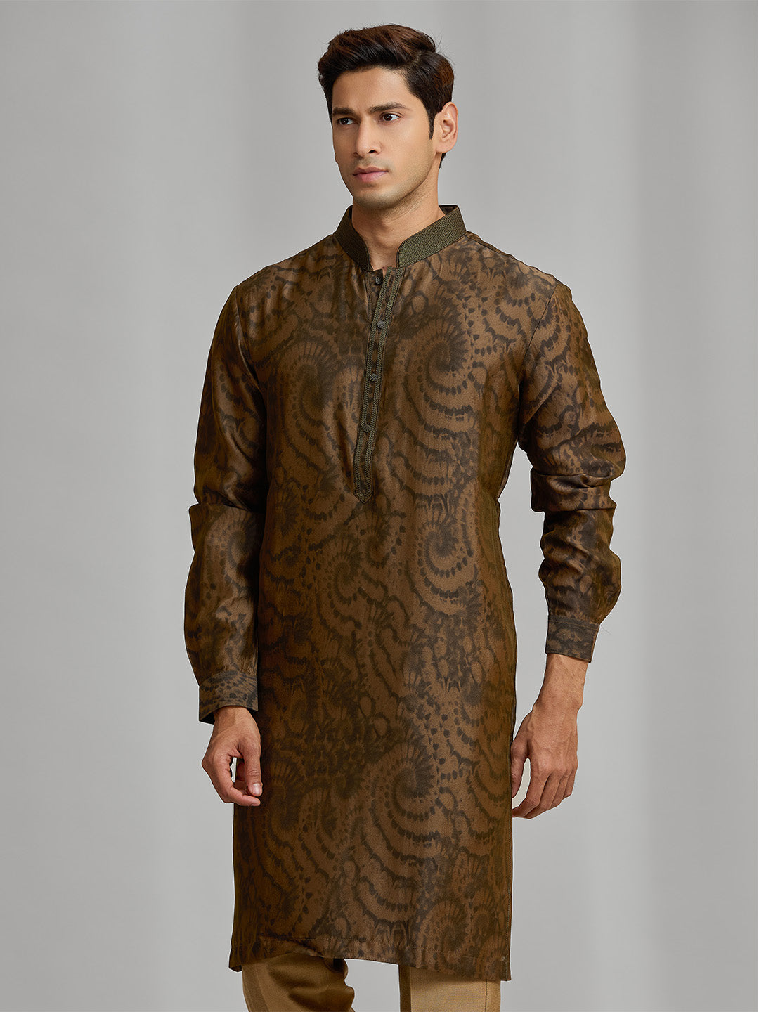 Olive silk-blend kurta with rhythmic print, paired with antique gold Aligarhi pants. - KORANM