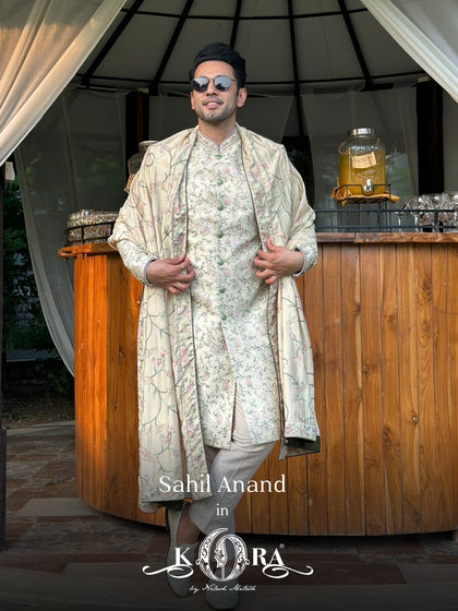 Sahil Anand radiates royal charm in our pista raw silk embroidered sherwani with dupatta and churidar