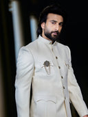 Kora by Nilesh Mitesh cream Matka silk Bandhgala set worn by Meezaan Jafri