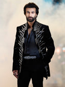 Men’s royal black Jodhpuri suit paired with matching black pants