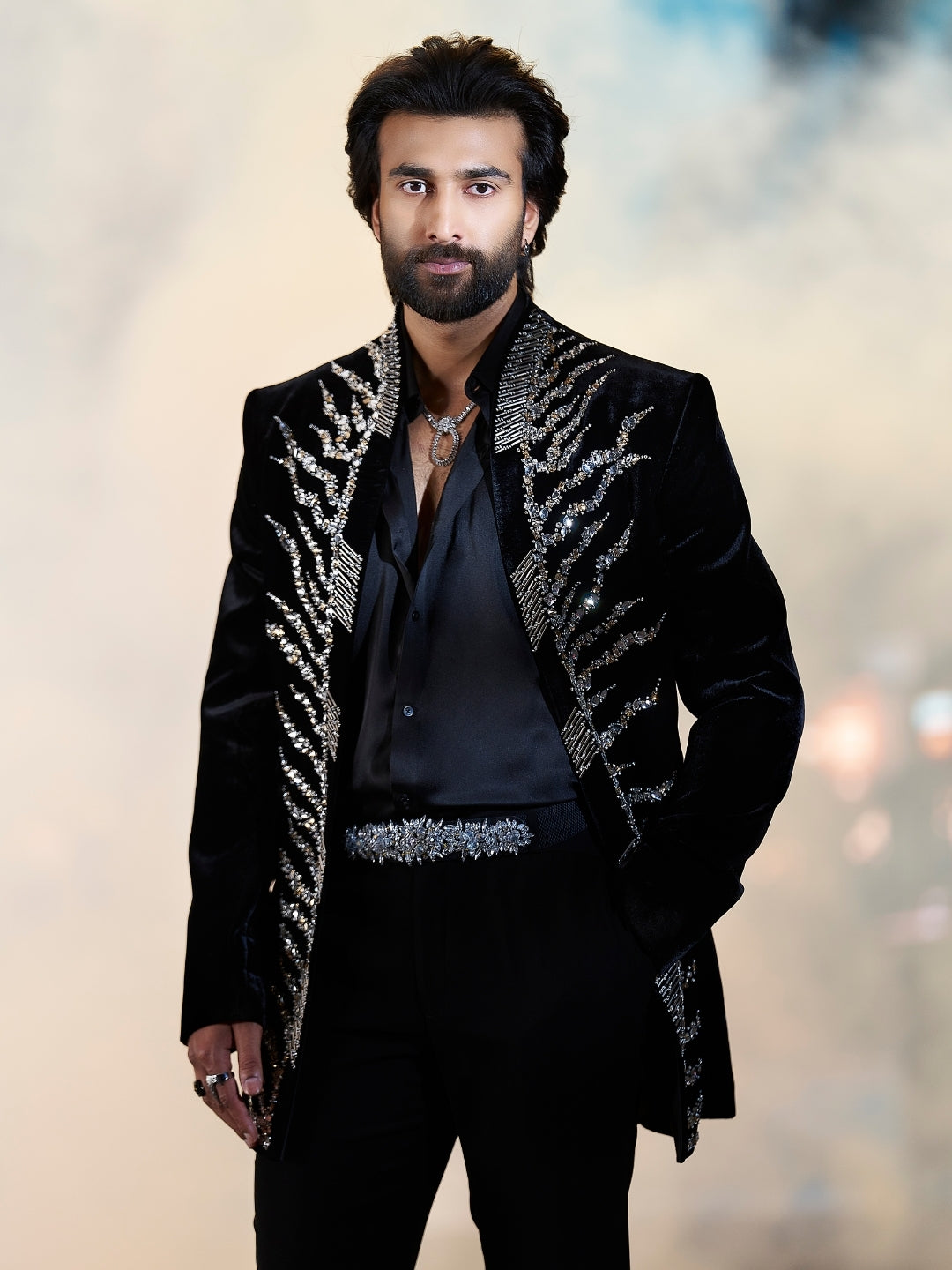 Men’s royal black Jodhpuri suit paired with matching black pants