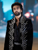 Close-up of hand embroidery detailing on black velvet Jodhpuri jacket