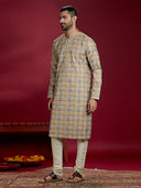 Mustard Jacquard Print Kurta Paired with an Natural Chudidar for Men