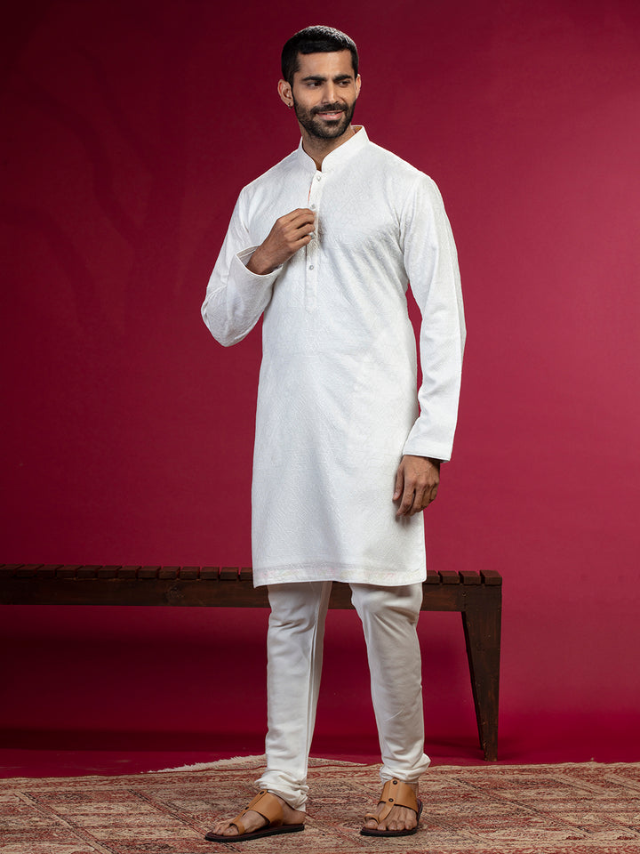 Cream Kurta with sequence work and Aligadi pants.