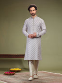 Lilac Kurta with Jacquard's fabric and Chudidar. - KORANM