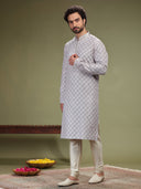 Lilac Kurta with Jacquard's fabric and Chudidar. - KORANM