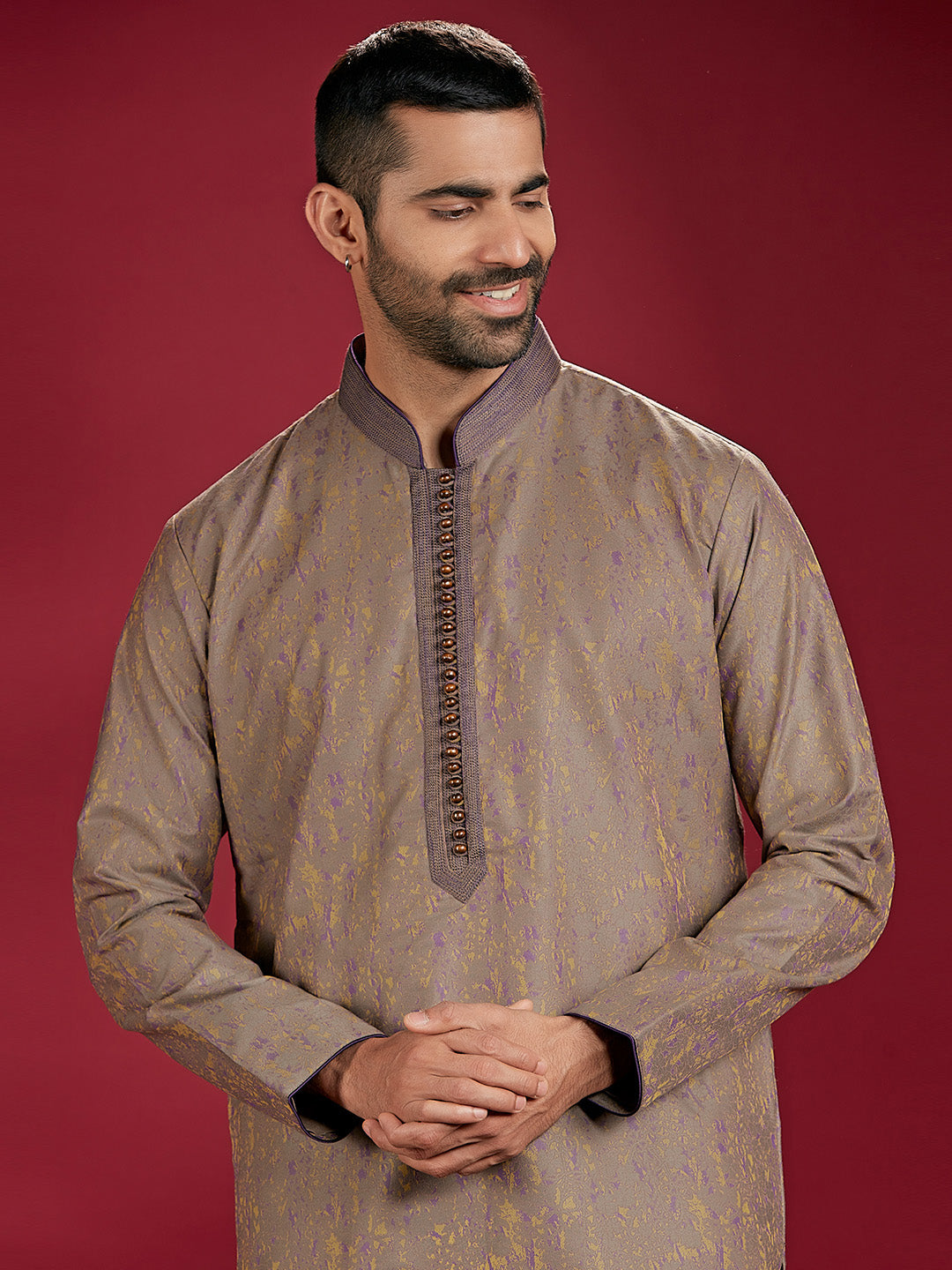 Olive Jacquard Rubelli Kurta Paired with an Olive Chudidar.