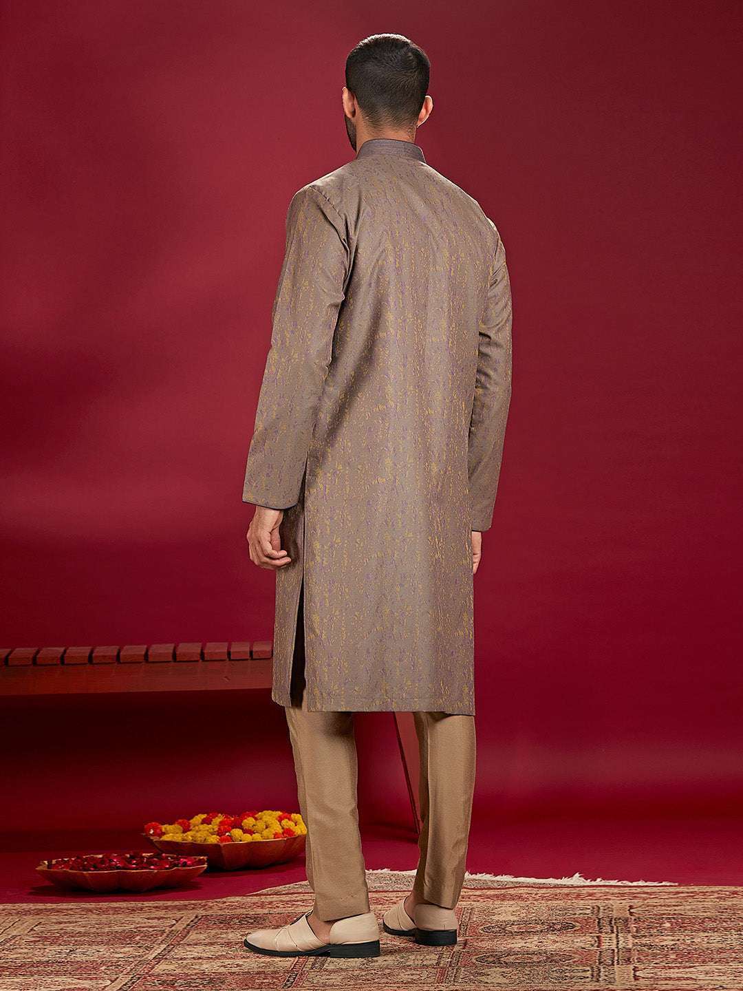 Olive Jacquard Rubelli Kurta Paired with an Olive Chudidar.