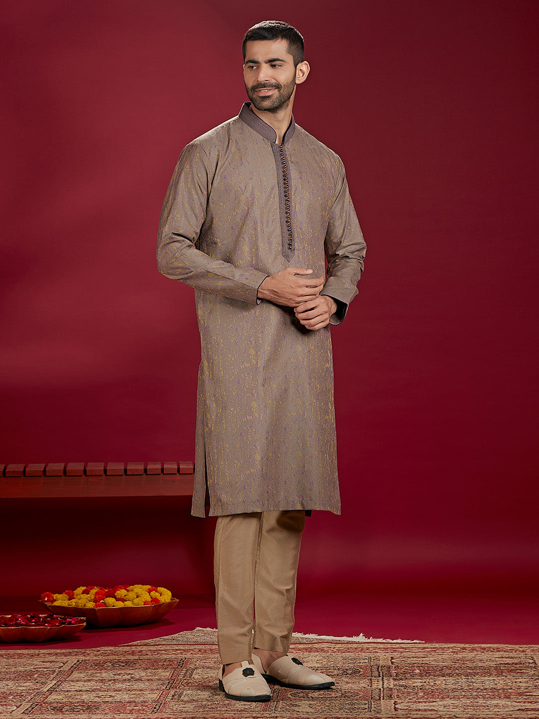 Olive Jacquard Rubelli Kurta Paired with an Olive Chudidar.