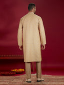 Olive Jacquard Rubelli Kurta Paired with an Olive Colour Chudidar.