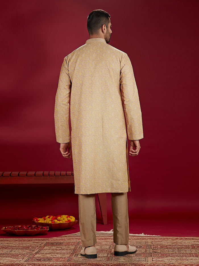 Olive Jacquard Rubelli Kurta Paired with an Olive Colour Chudidar.