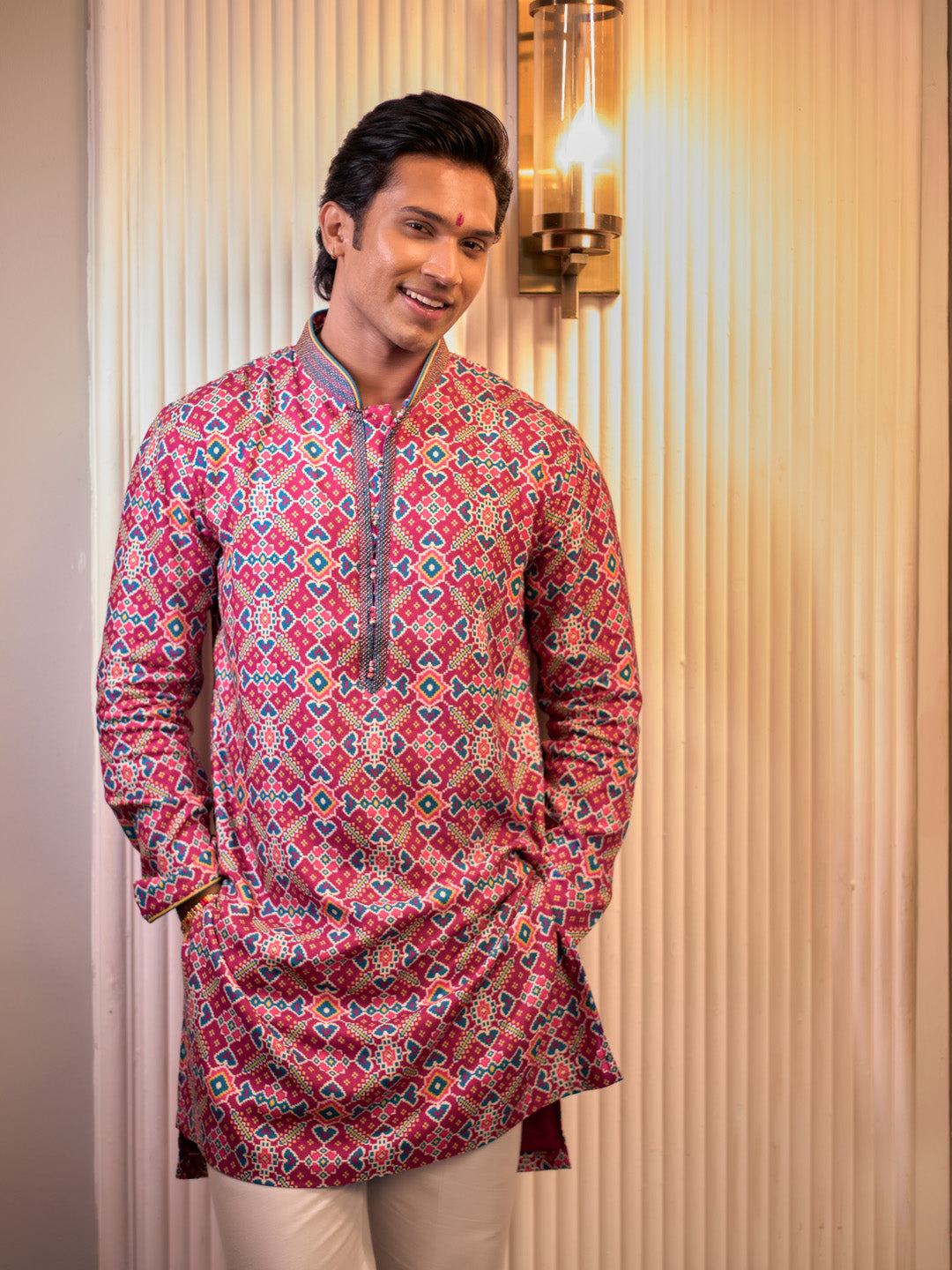 Magenta Kurta set with patola print and chudidar.