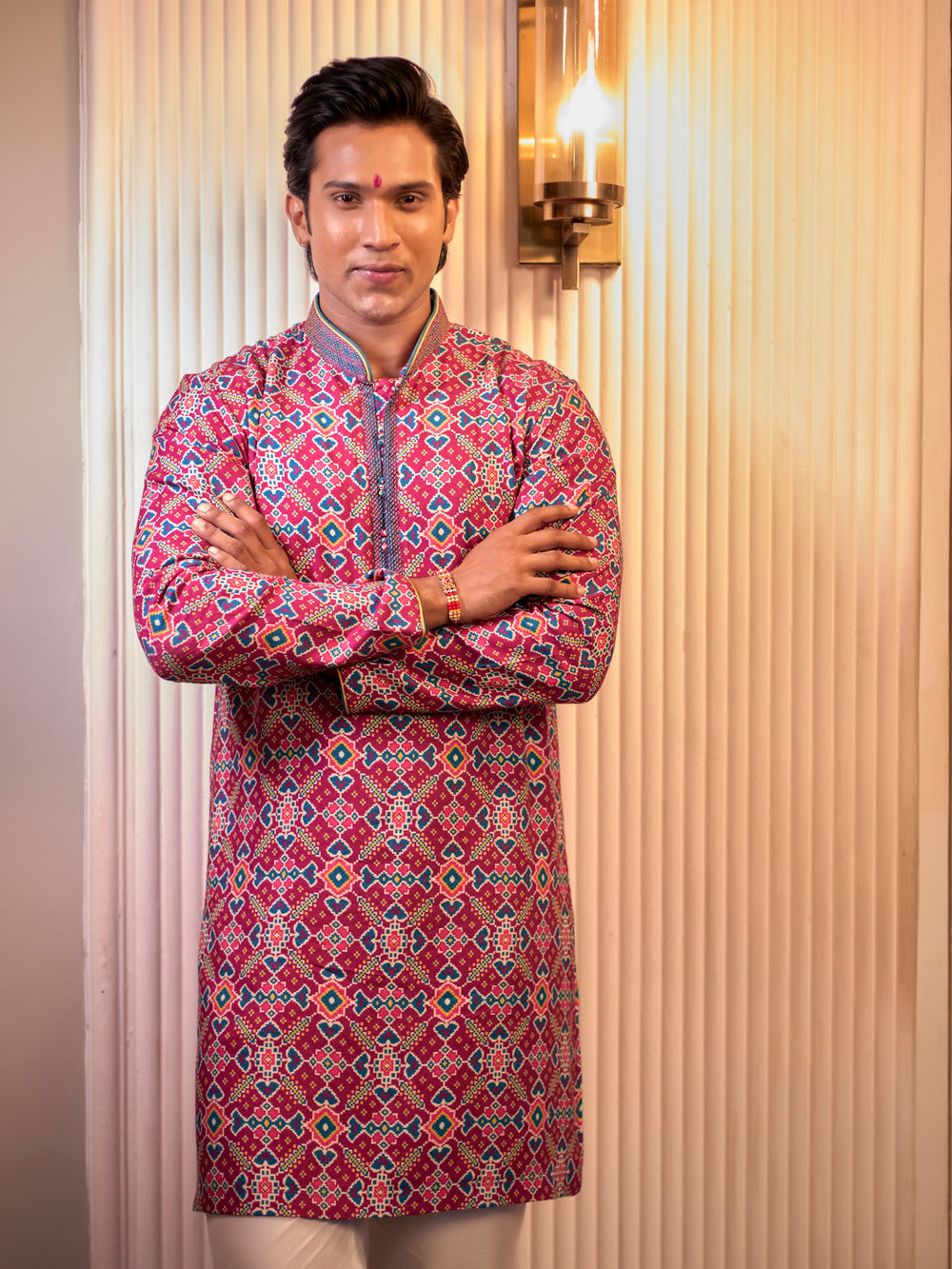 Magenta Kurta set with patola print and chudidar.