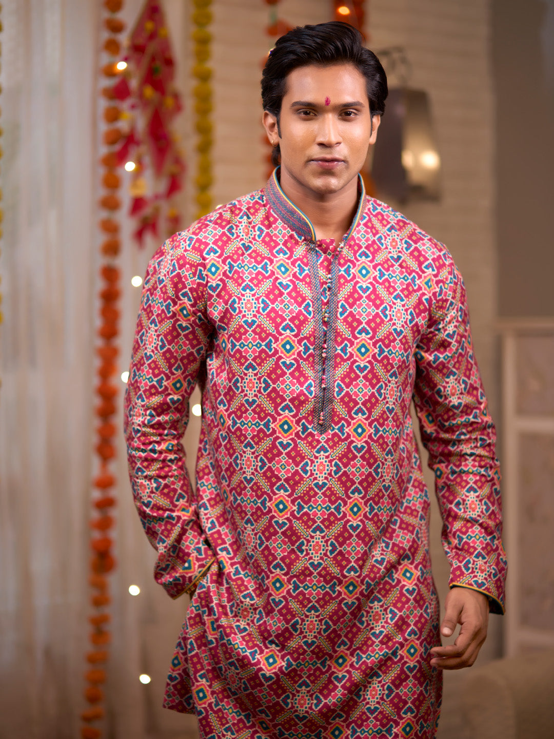 Magenta Kurta set with patola print and chudidar.