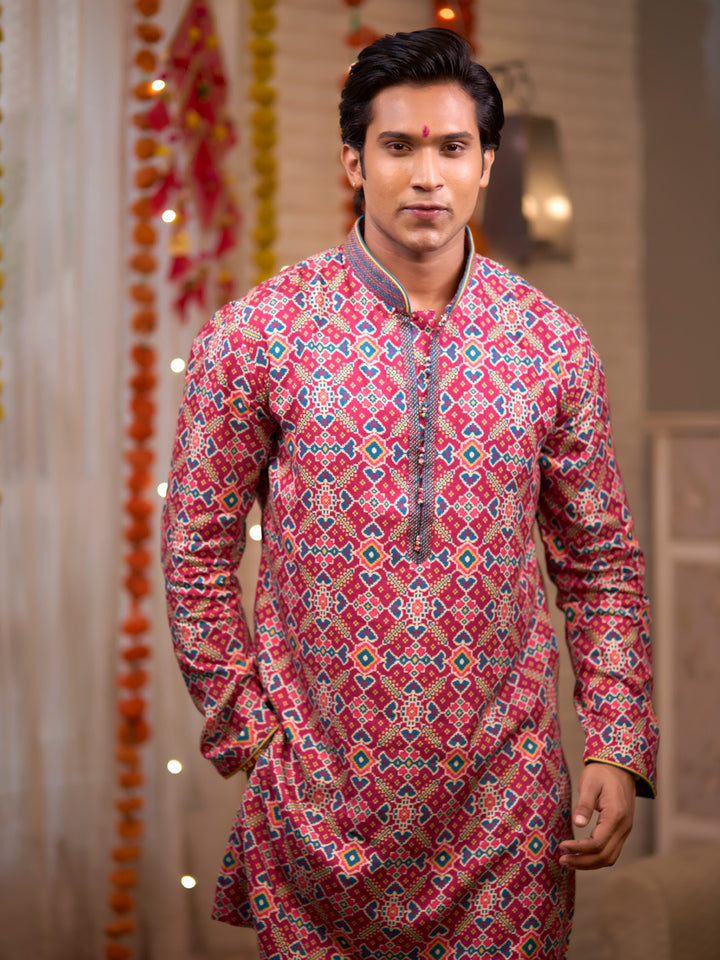 Magenta Kurta set with patola print and chudidar.