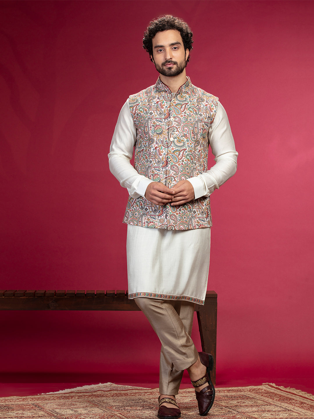 Kurta with Kashmiri works on Bundi and Aligadi pants.