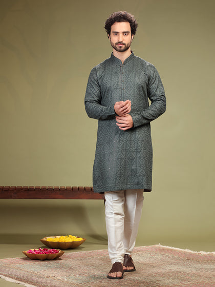 Grey Kurta with sequence work and  Aligarhi pants.