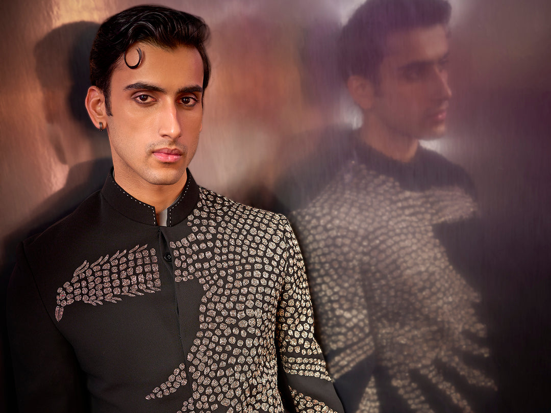 Black textured silk Jodhpuri suit with embroidery and coordinated pants.