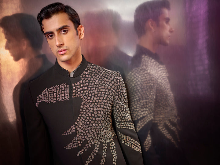 Black textured silk Jodhpuri suit with embroidery and coordinated pants.