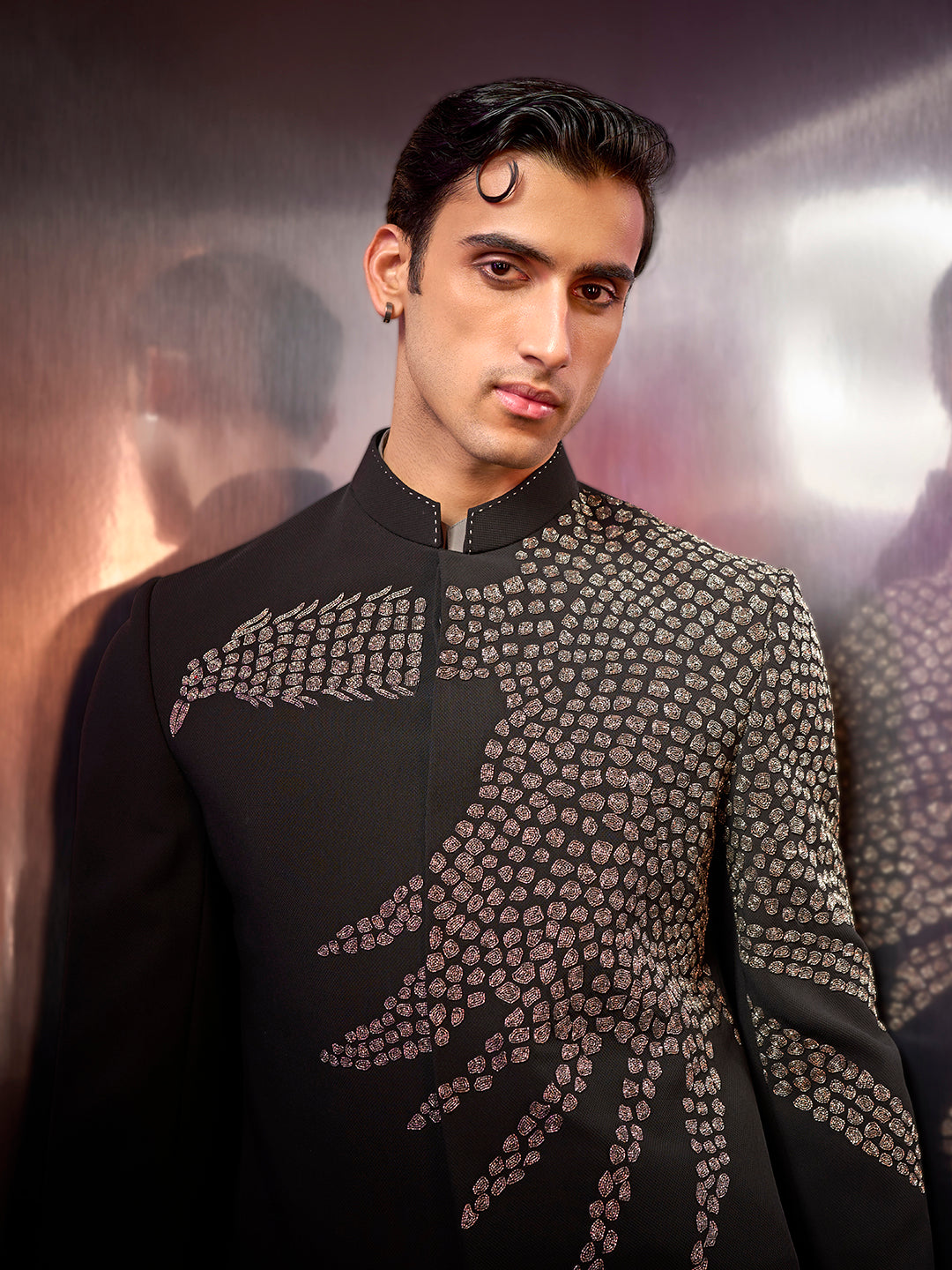 Black textured silk Jodhpuri suit with embroidery and coordinated pants.