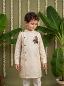Beige Linen Satin Side-Open Elephant Printed Kurta with Off-White Aligarhi Pant Set for Boys - KORANM