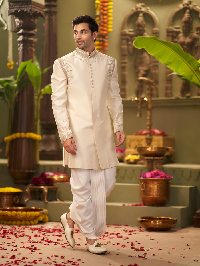 Muhurtham set with cream Raw Silk hand highlight work on Sherwani, and Dhoti