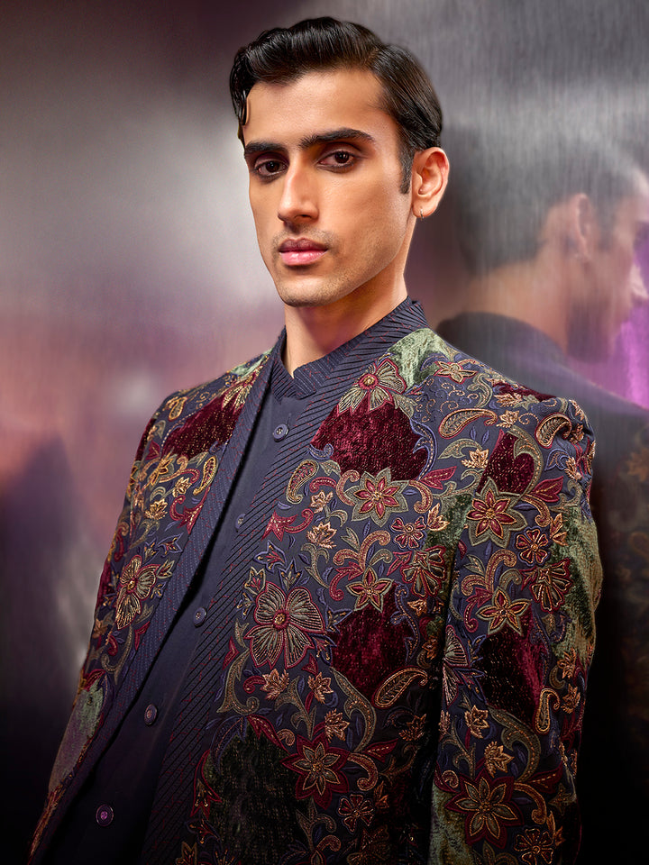 Navy textured silk Indo-Western set with embroidery, kurta, and matching pants.
