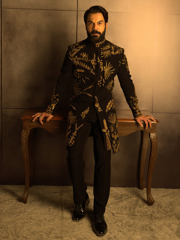Black Indowestern with Gold Zardozi Embroidery Paired with a Black Aligadi Pant.