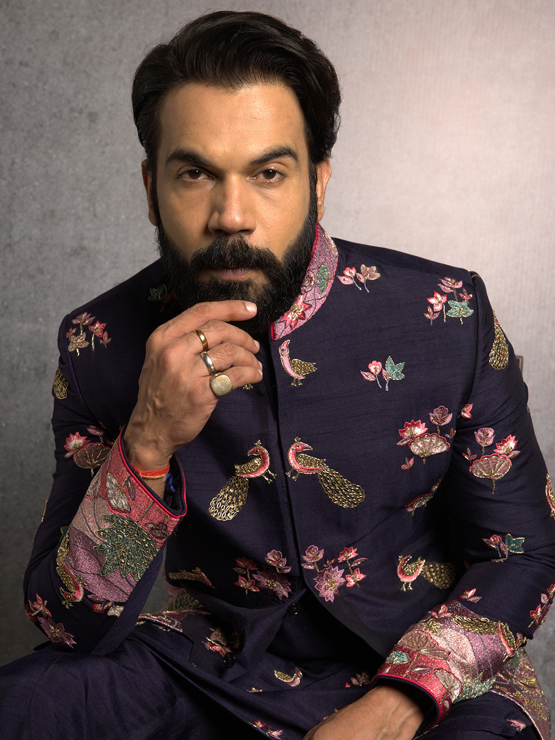 Blue Jodhpuri and Kurta with Resham and Zari ThreadWork with Gold Highlights Paired with Blue Aligadi Pant.