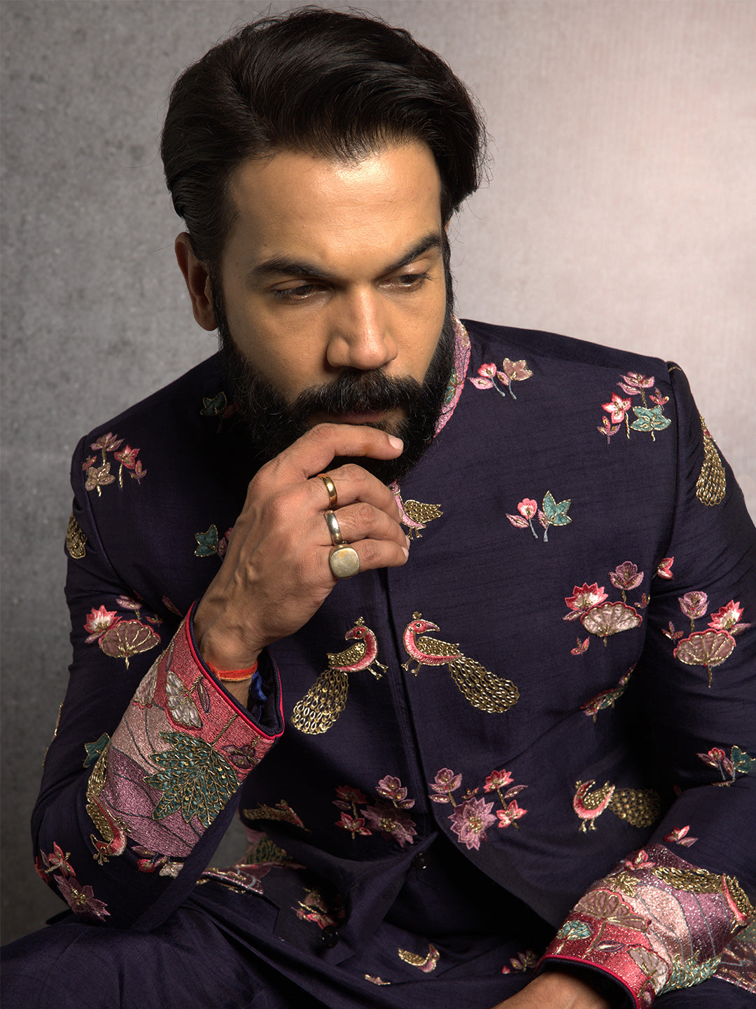 Blue Jodhpuri and Kurta with Resham and Zari ThreadWork with Gold Highlights Paired with Blue Aligadi Pant.