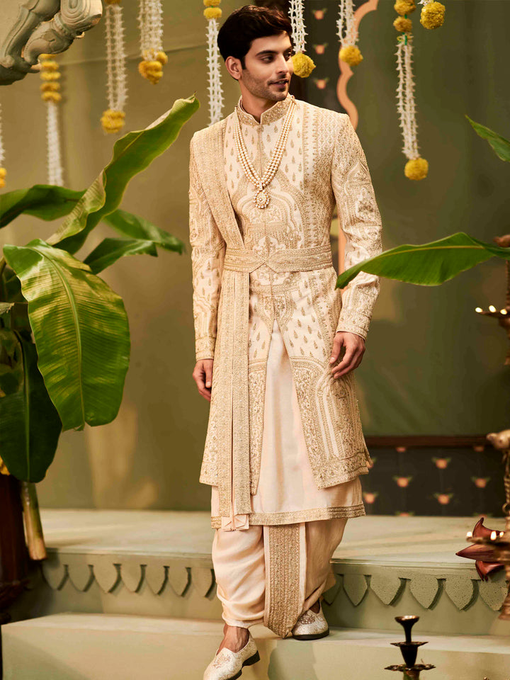 Muhurtham set with embroidery Kurta, sherwani, dupatta, dhoti, and kamarband.