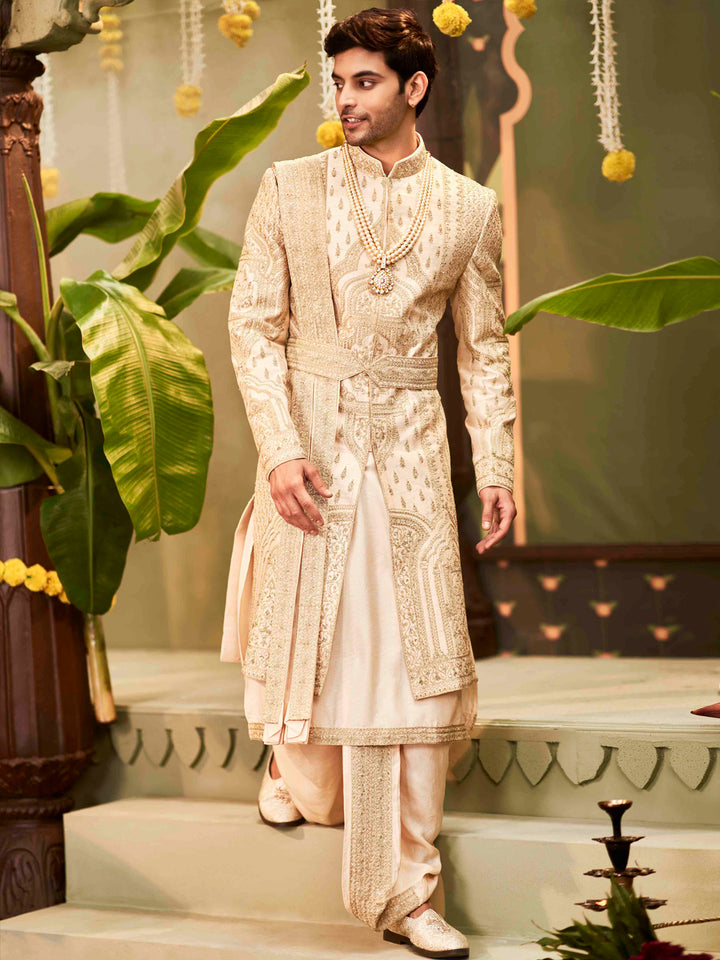 Muhurtham set with embroidery Kurta, sherwani, dupatta, dhoti, and kamarband.