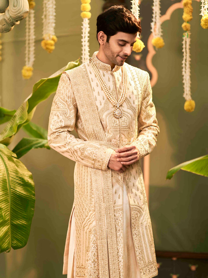 Muhurtham set with embroidery Kurta, sherwani, dupatta, dhoti, and kamarband.