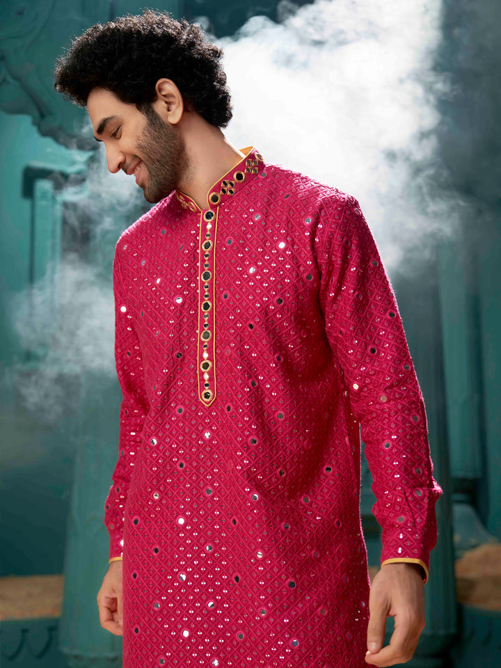 A Pink mirror effect kurta with yellow detailing