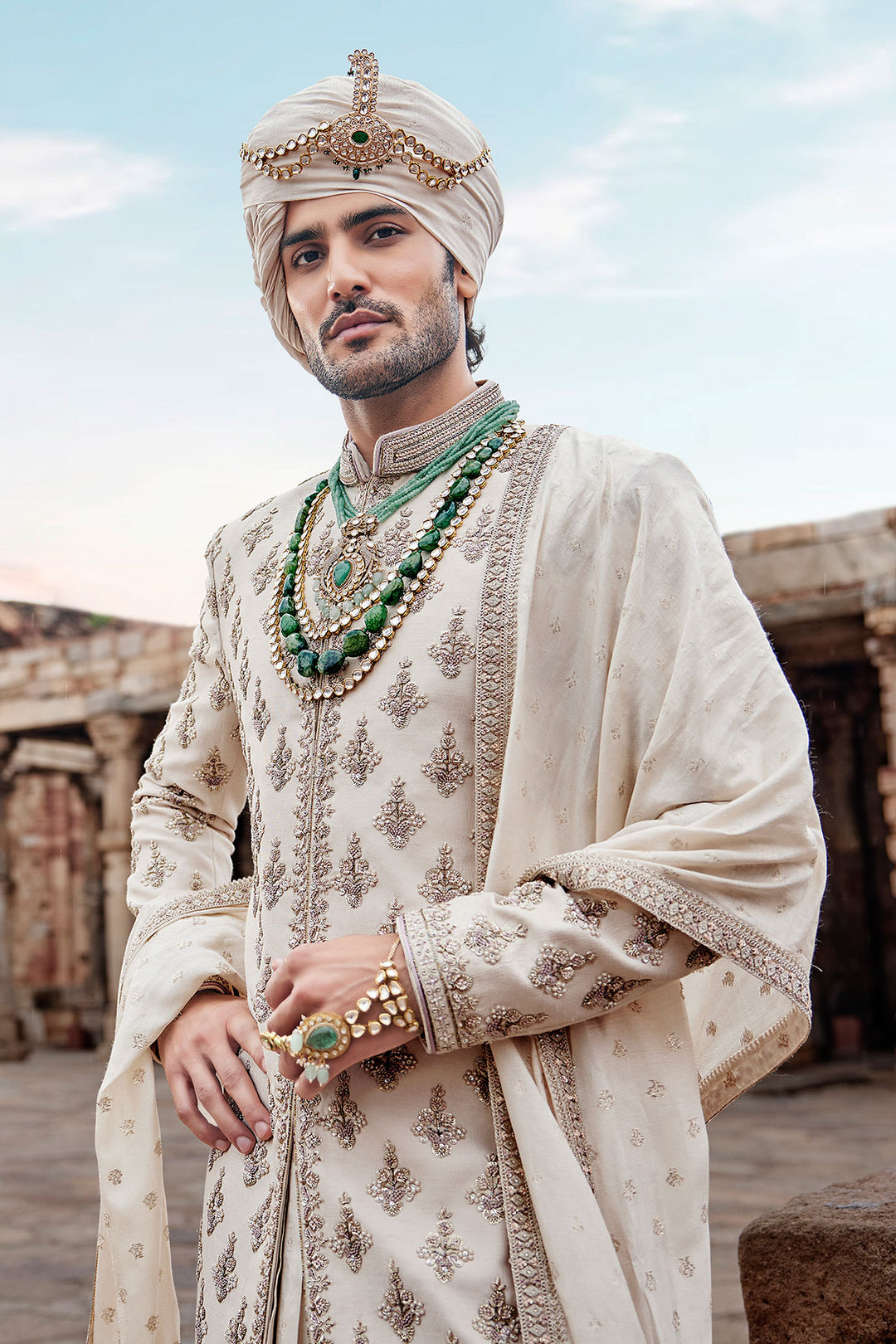 Beige Embroidered Sherwani with Anarkali Silk Kurta and Beige Churidaar for Groom.