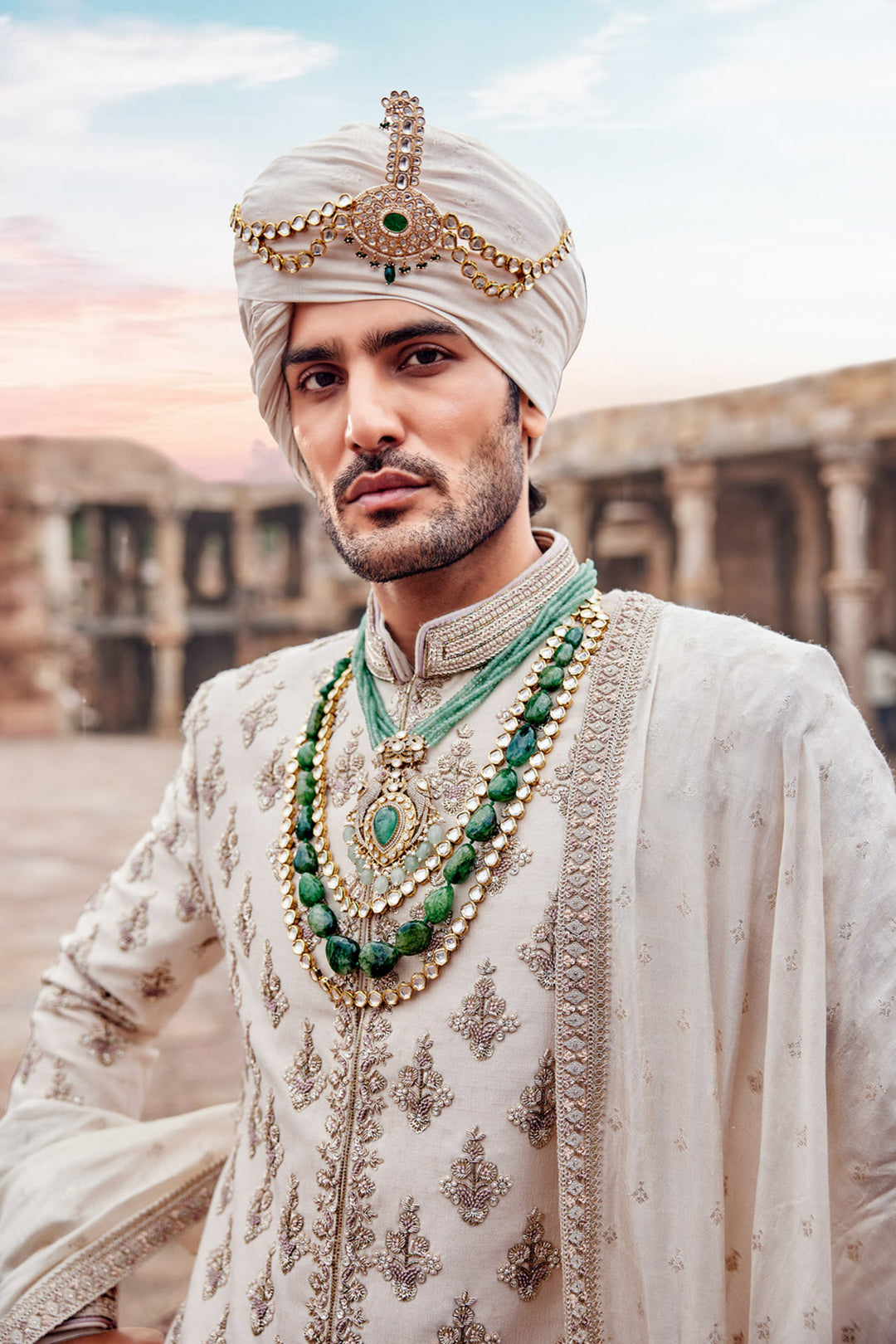 Beige Embroidered Sherwani with Anarkali Silk Kurta and Beige Churidaar for Groom.