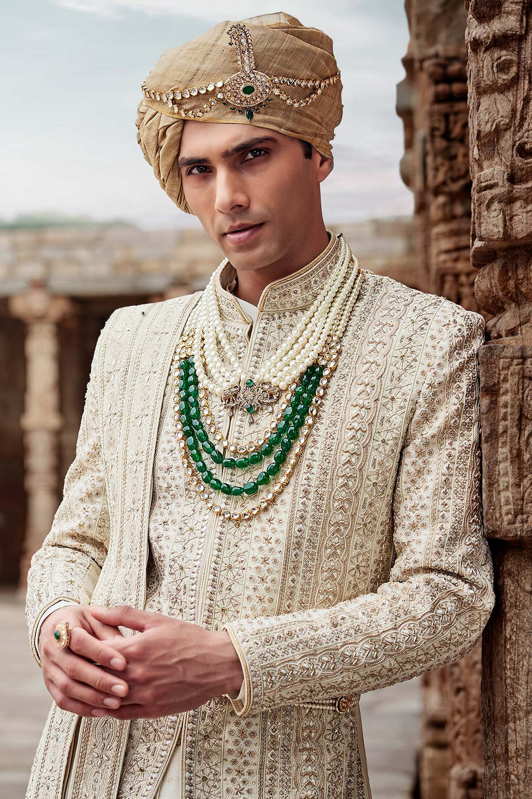 Cream Silk Sherwani, Embroidered Anarkali Kurta, and Churidaar.