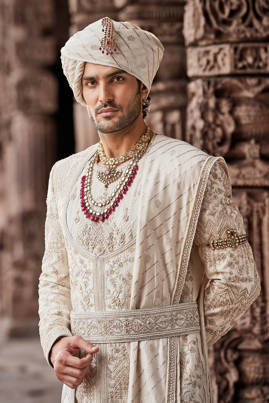 Cream Embroidered Sherwani with Anarkali Silk Kurta and Cream Churidaar.