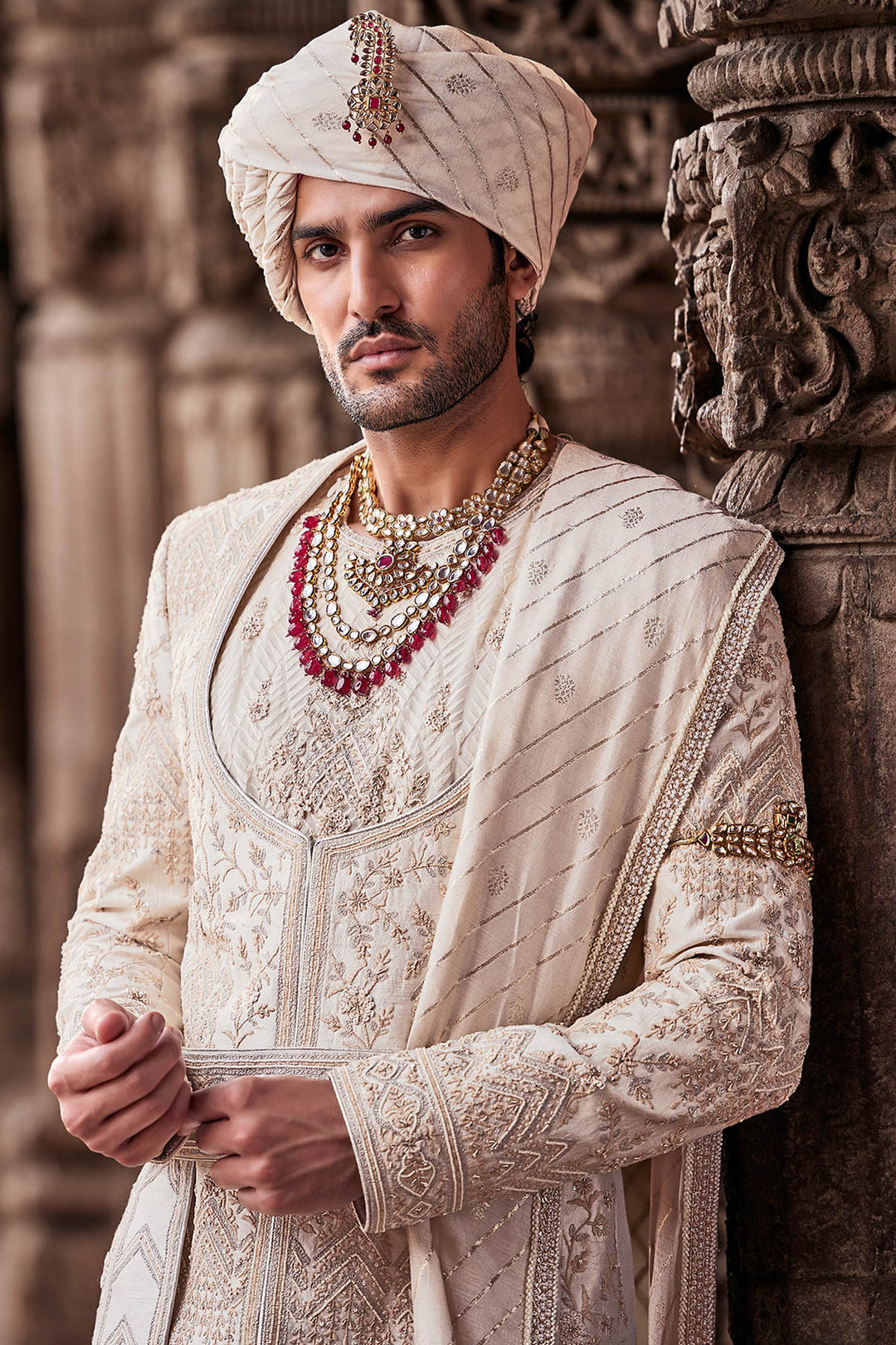 Cream Embroidered Sherwani with Anarkali Silk Kurta and Cream Churidaar.