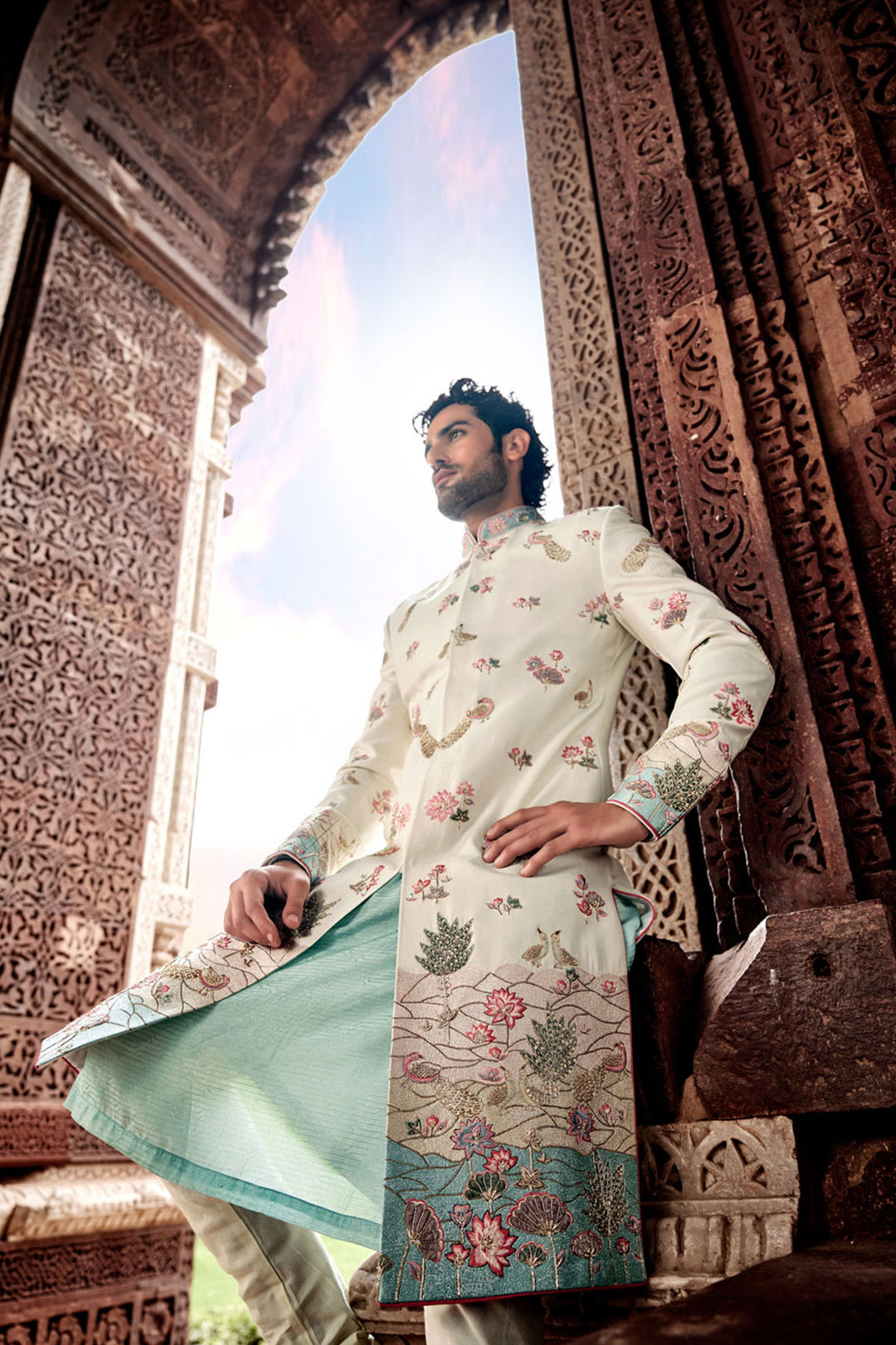 Cream Tesla Fabric Sherwani with Matching Kurta, Dupatta, and Churidaar.