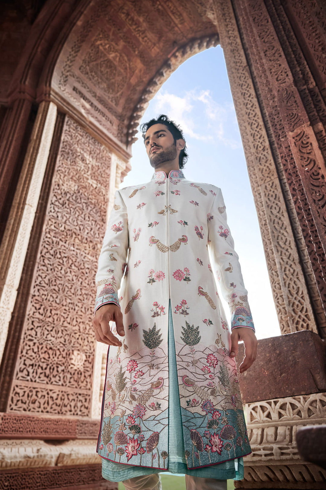 Cream Tesla Fabric Sherwani with Matching Kurta, Dupatta, and Churidaar.