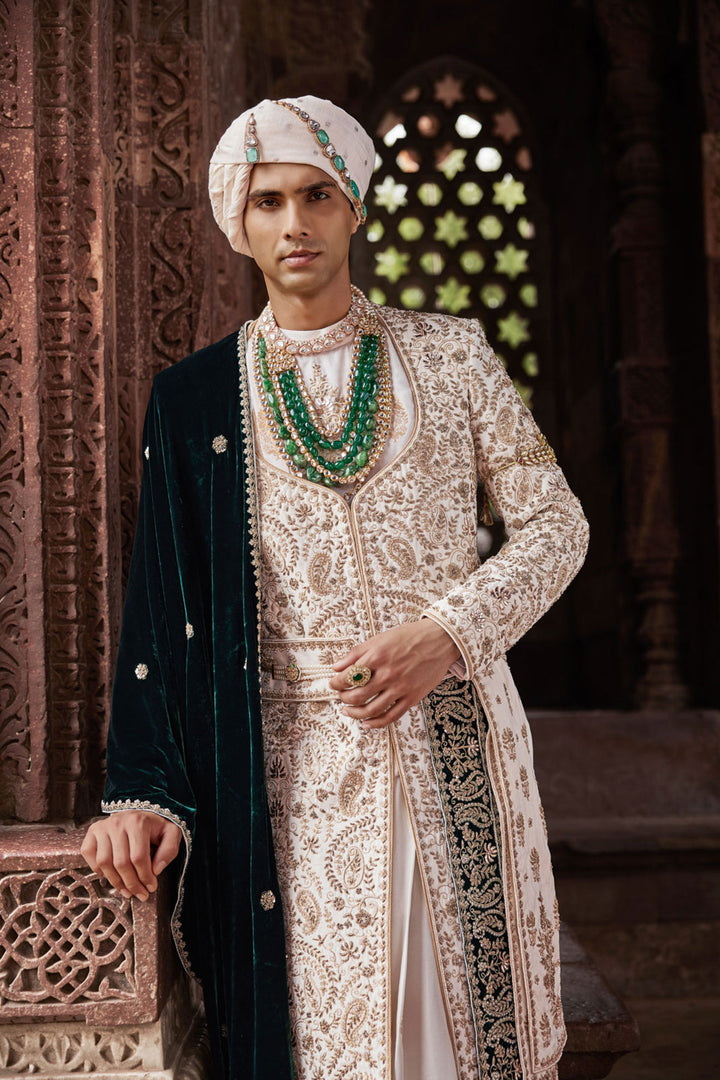 Cream Tesla Fabric Sherwani with Kurta, Dupatta, Kamarband, and Churidaar.