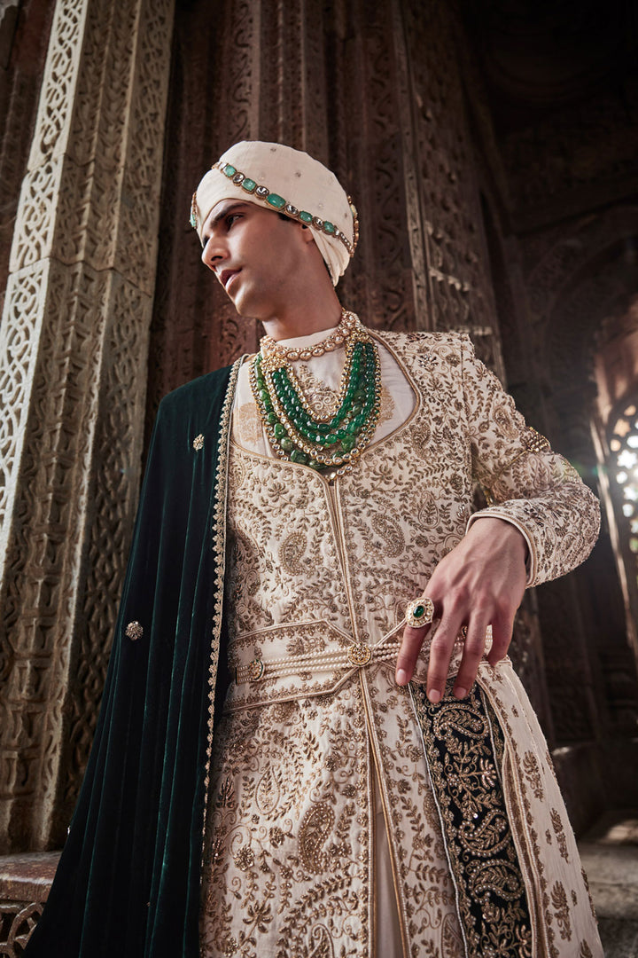 Cream Tesla Fabric Sherwani with Kurta, Dupatta, Kamarband, and Churidaar.