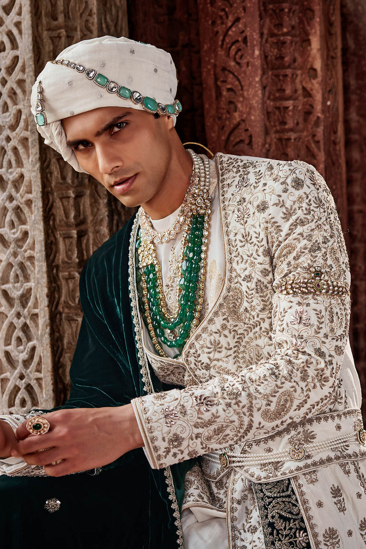 Cream Tesla Fabric Sherwani with Kurta, Dupatta, Kamarband, and Churidaar.