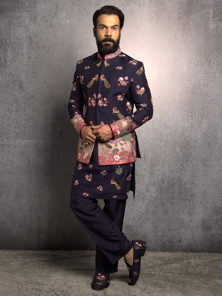Blue Jodhpuri and Kurta with Resham and Zari ThreadWork with Gold Highlights Paired with Blue Aligadi Pant.
